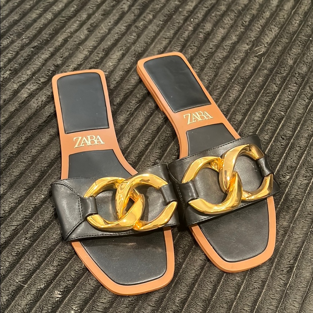 ZARA Black Slide Sandals with Gold Chain Accent and Tan Trim